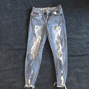 Good condition blue jean ripped pants.